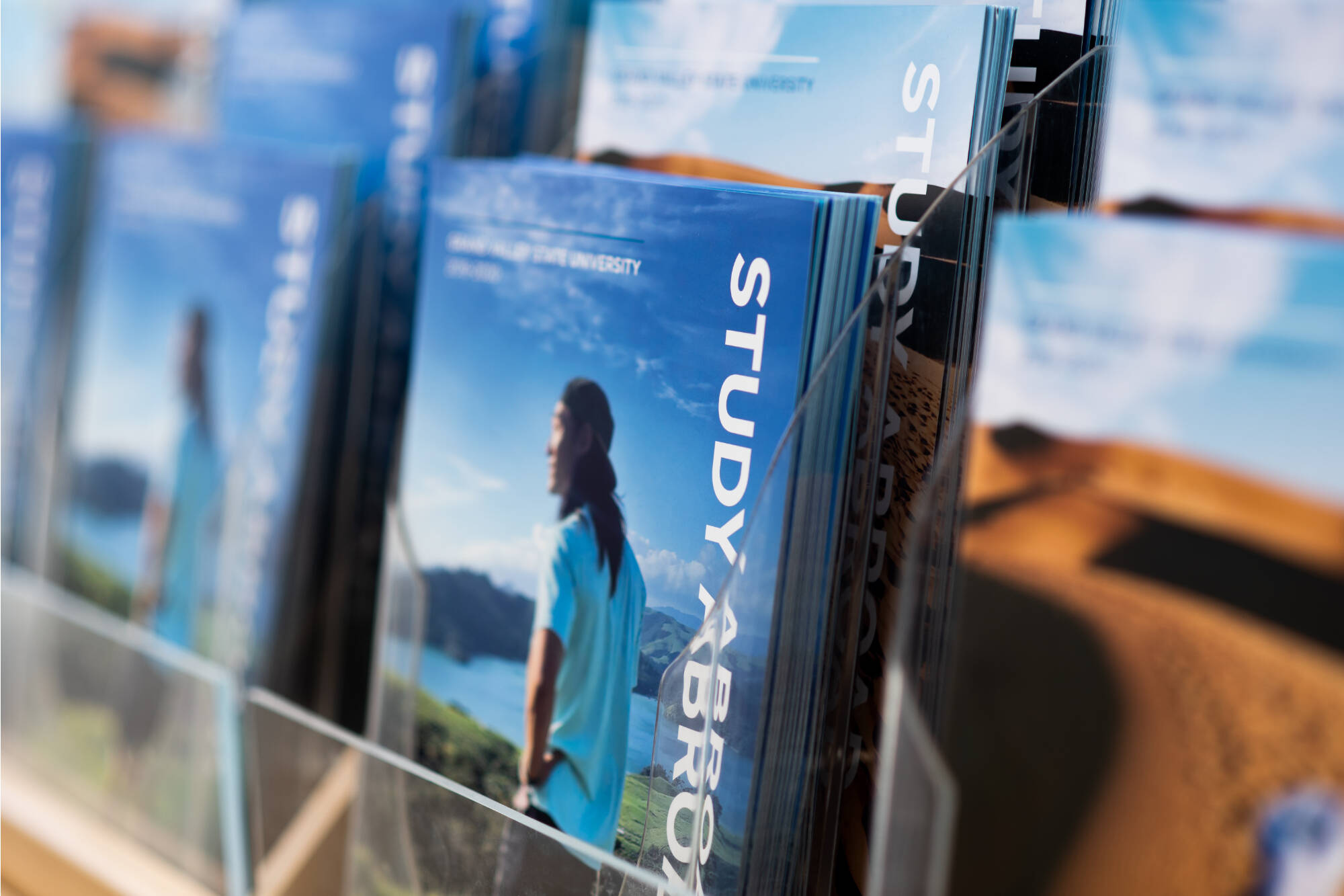 Study Abroad catalogs on display outside the Padnos International Center